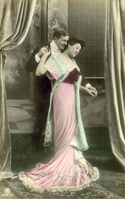 Man making advances on fashionable lady by French Photographer